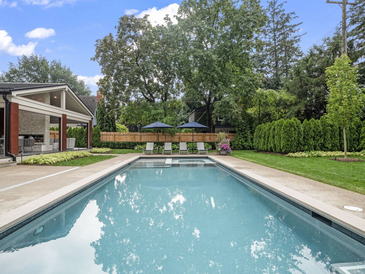 Cozy Patio with Fireplace and Pool | Great Oaks Landscape