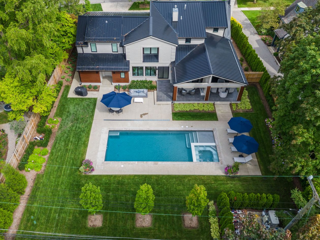 Cozy Patio with Fireplace and Pool | Great Oaks Landscape