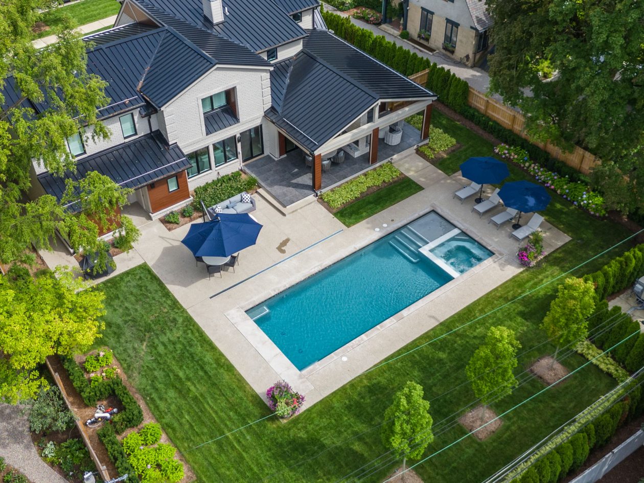 Cozy Patio with Fireplace and Pool | Great Oaks Landscape