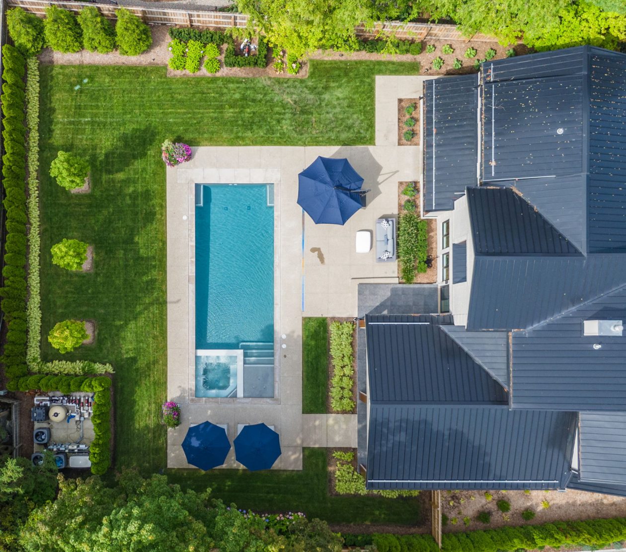 Cozy Patio with Fireplace and Pool | Great Oaks Landscape