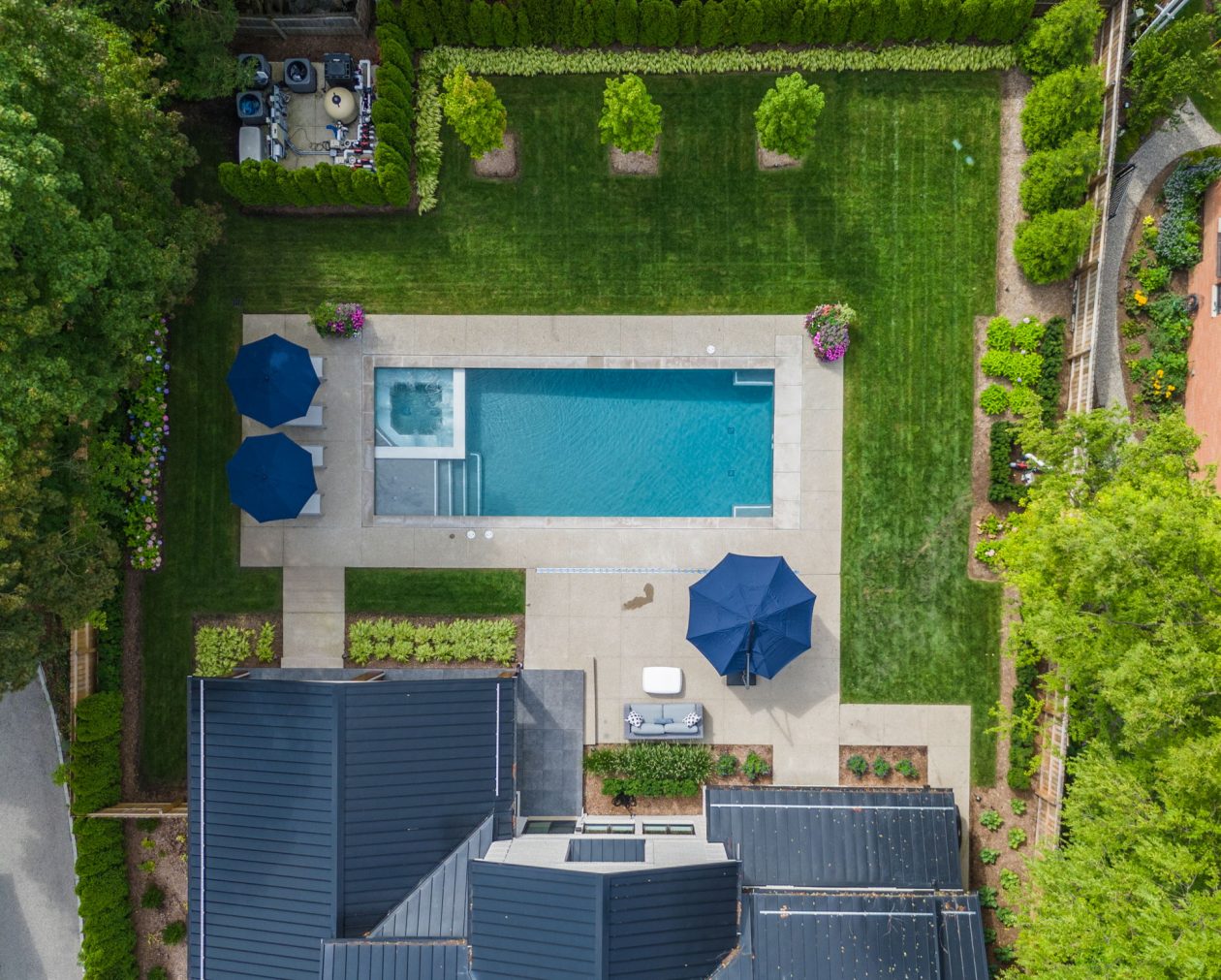 Cozy Patio with Fireplace and Pool | Great Oaks Landscape