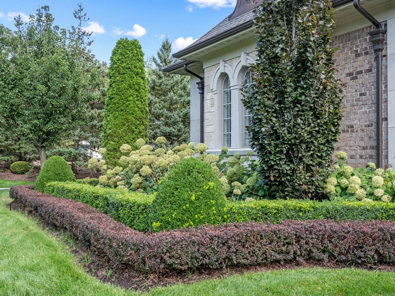 Orchard Lake Limestone Chateau | Great Oaks Landscape